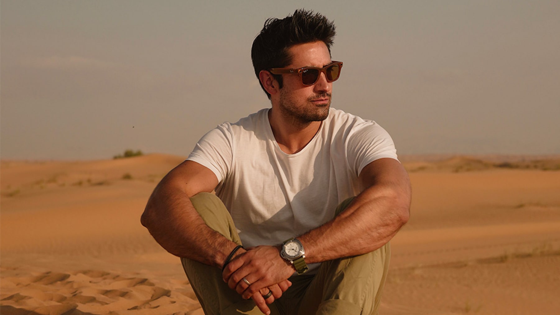 Jeremy Jauncey sitting in the desert